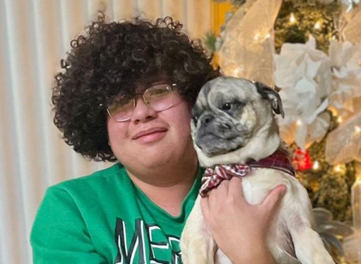 Photo of Image of child with dog